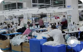 Sportswear sewing line showing garment assembly in an OEM sportswear manufacturer workshop