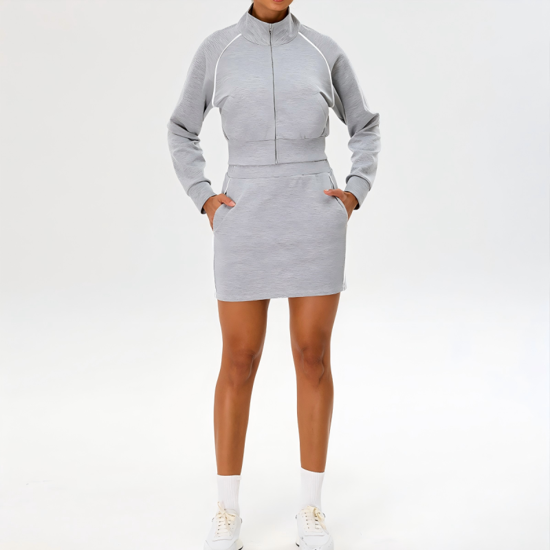 Grey women tracksuit sample with skirt for private label sportswear production