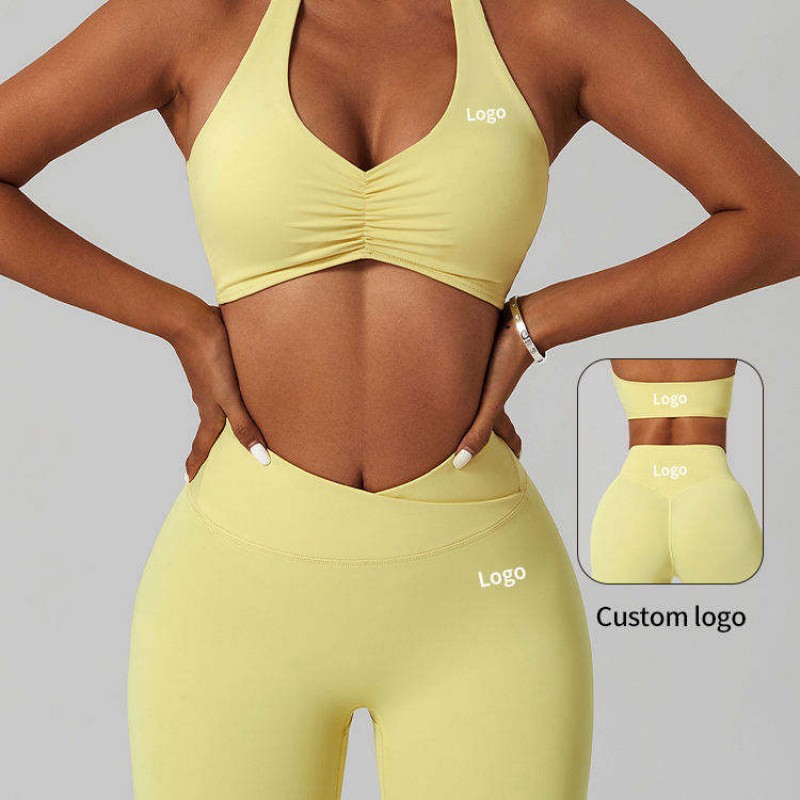 Yellow custom yoga wear set with logo placement for OEM sportswear manufacturer